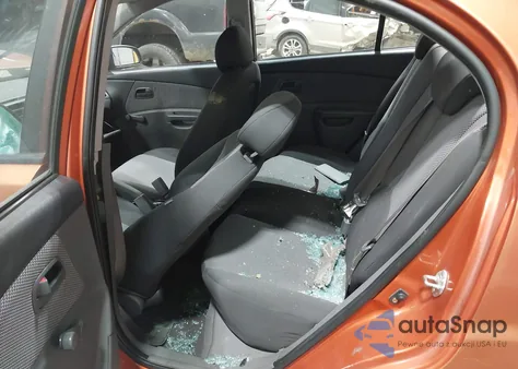 2009 Kia Rio Lx z USA, uszkodzony, nr VIN KNADE223X96447092